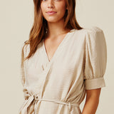 BEACHWOOD CANYON ruffle bottom wrap dress in naked - sand