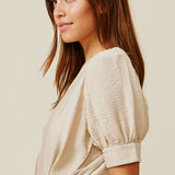 BEACHWOOD CANYON ruffle bottom wrap dress in naked - sand