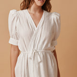 BEACHWOOD CANYON ruffle bottom wrap dress in naked - white