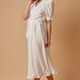 BEACHWOOD CANYON ruffle bottom wrap dress in naked - white