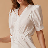 BEACHWOOD CANYON ruffle bottom wrap dress in naked - white
