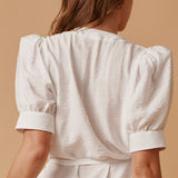 BEACHWOOD CANYON ruffle bottom wrap dress in naked - white